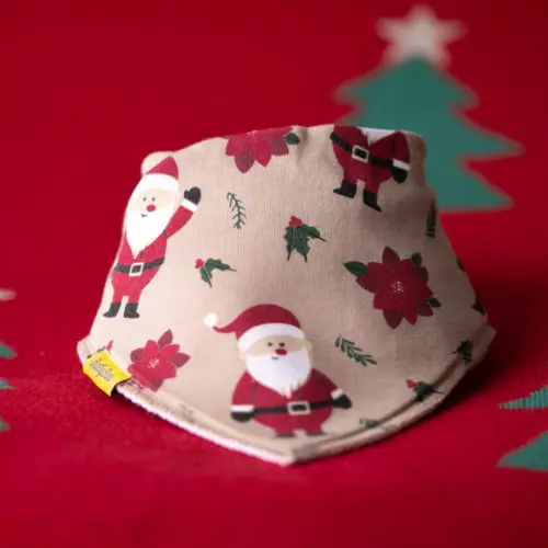 Fawn Santa and poinsetta organic cotton bandana bib